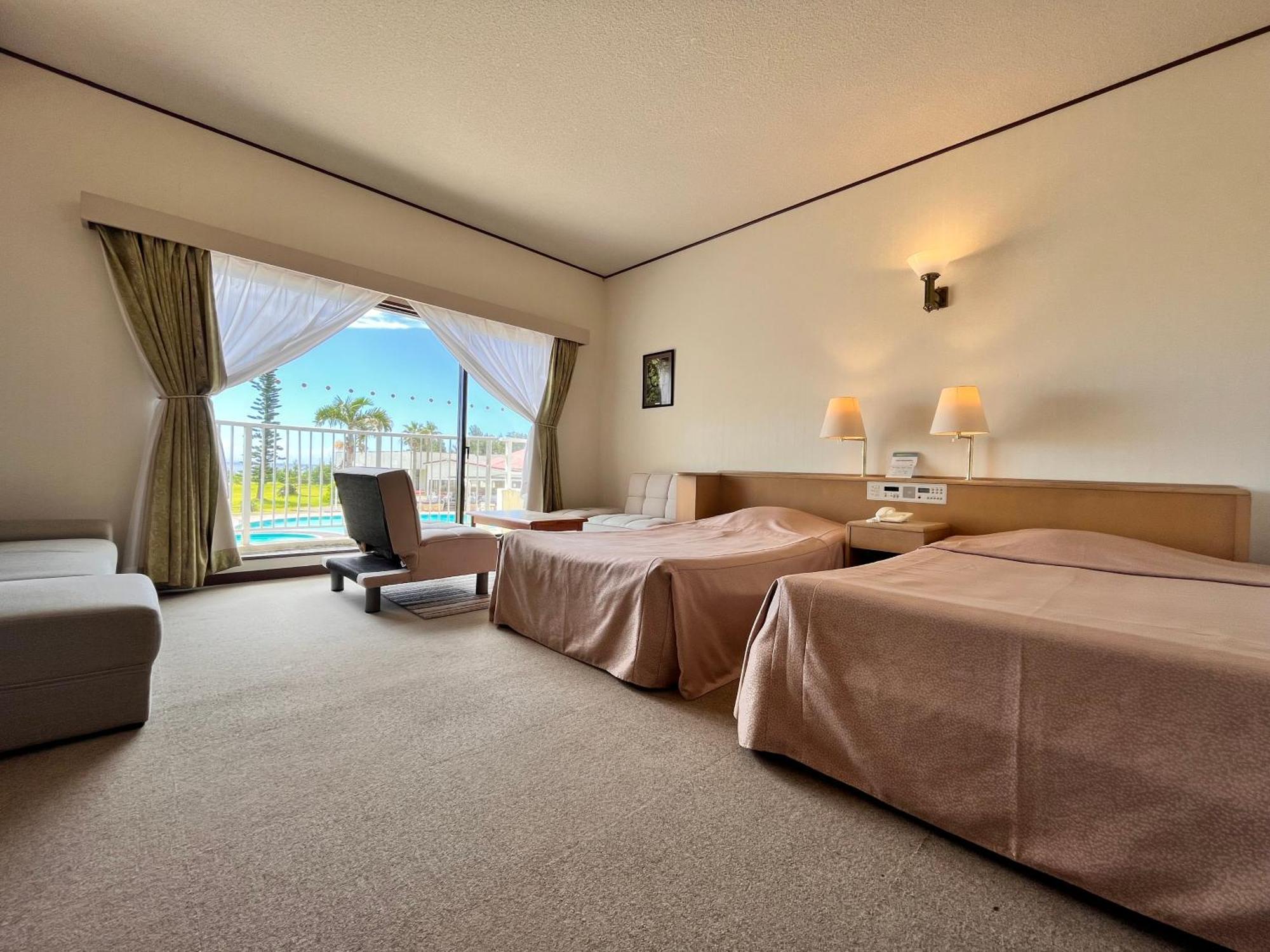 奄美市 珊瑚棕榈旅馆酒店 客房 照片